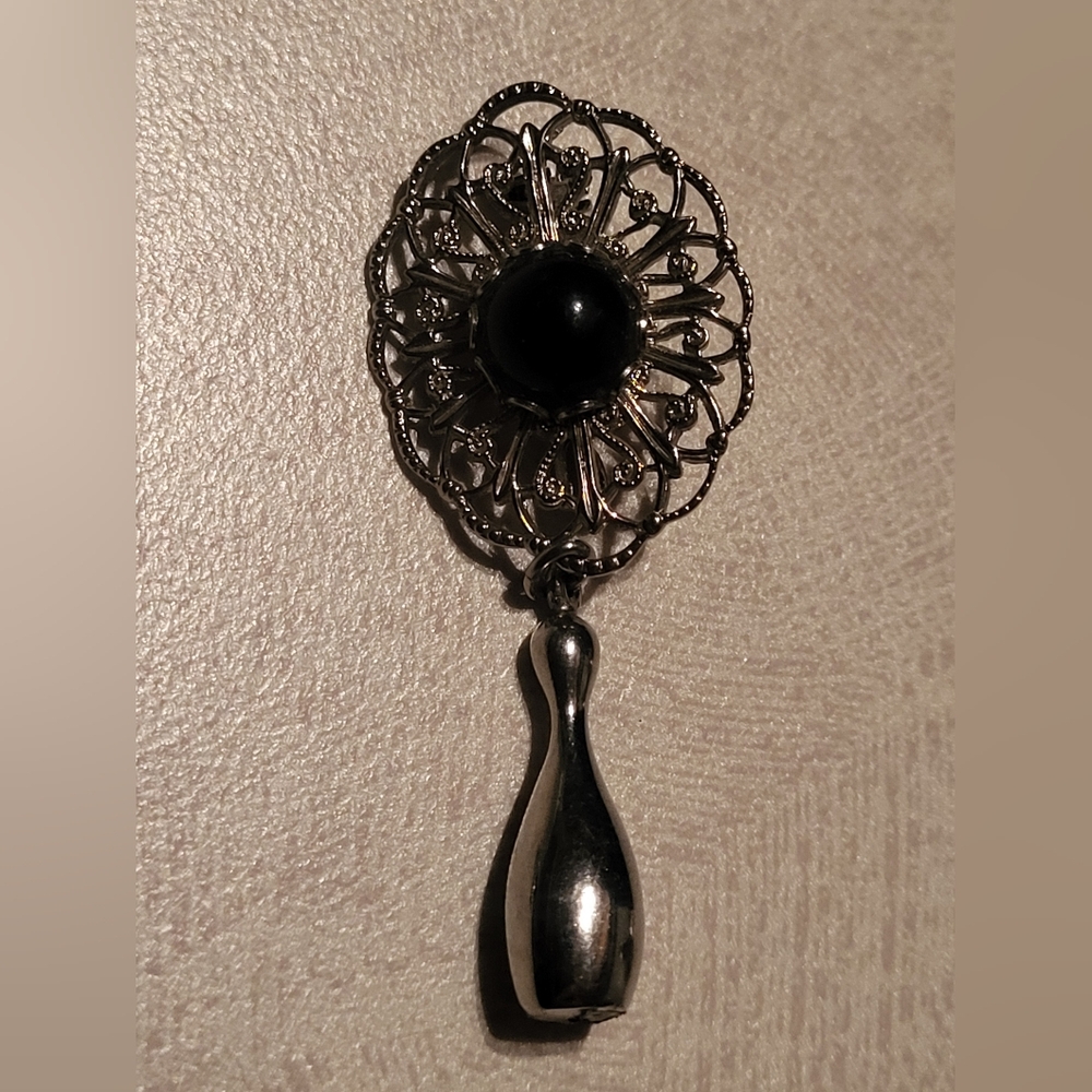 Black silver tone Vintage fillagree dangle brooch